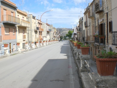 We are riding through the town of Campofiorito.